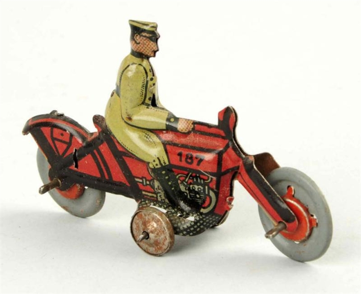 GERMAN TIN LITHO PENNY TOY MOTORCYCLE.            