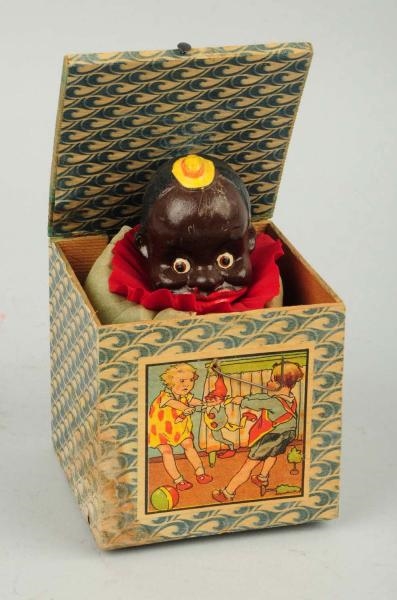 AFRICAN AMERICAN JACK IN BOX TOY.                 