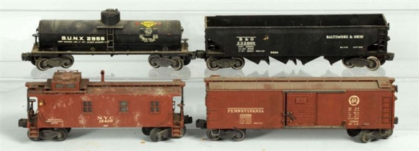 LOT OF 4: SEMI-SCALE FREIGHT CARS.                