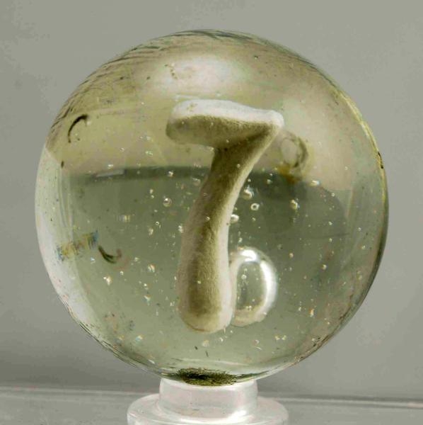 NUMERAL 7 SULPHIDE MARBLE.                        