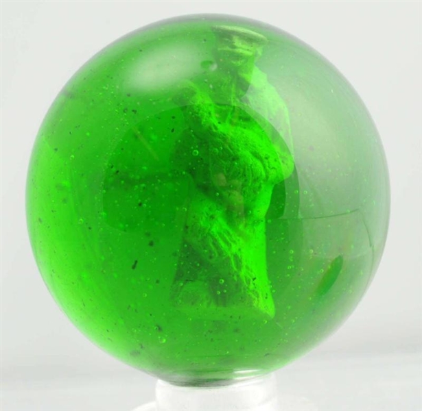 GREEN GLASS MAN PLAYING MANDOLIN SULPHIDE MARBLE. 