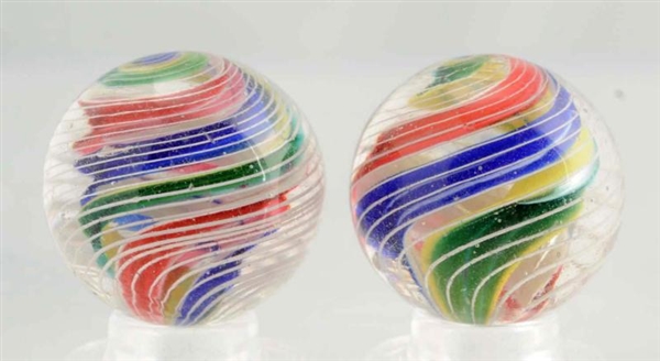 LOT OF 2: DIVIDED RIBBON CORE SWIRL MARBLES.      