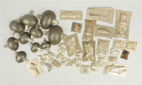 LARGE LOT OF ASSORTED SMALL CHOCOLATE MOLDS.      
