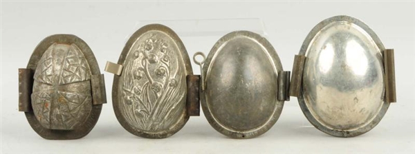 LOT OF 4: EGG SHAPED CHOCOLATE MOLDS.             