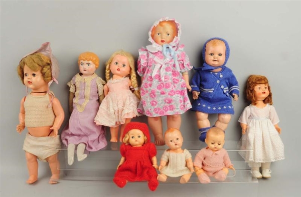 LOT OF 9: ASSORTED COMPOSITION & PLASTIC DOLLS.   