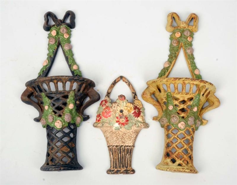 LOT OF 3: ASSORTED CAST IRON HANGING BASKETS.     