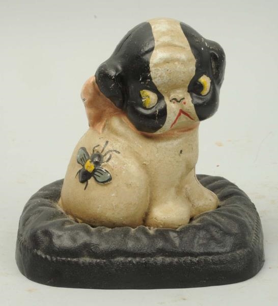 CAST IRON PUP WITH BEE ON HIP STILL BANK.         