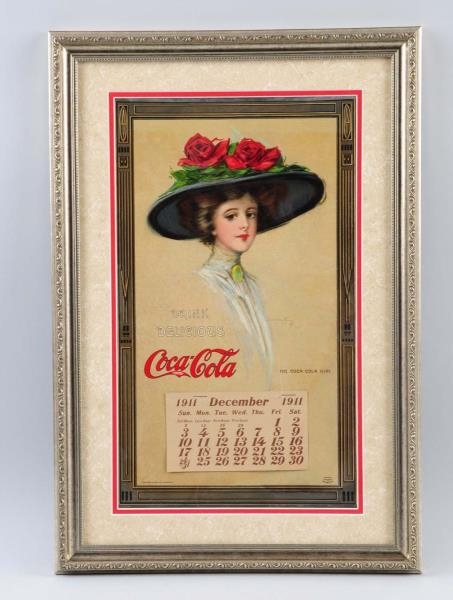 1911 FRAMED AND MATTED COCA COLA CALENDAR.        