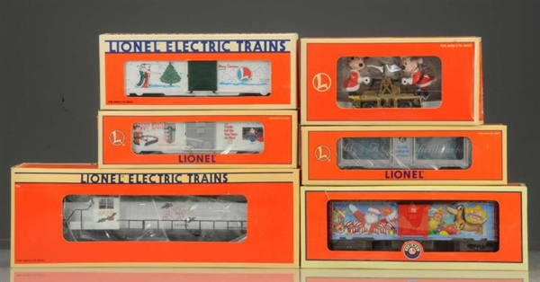 LIONEL 6PC MICKEY MOUSE & CHRISTMAS TRAIN CARS.   