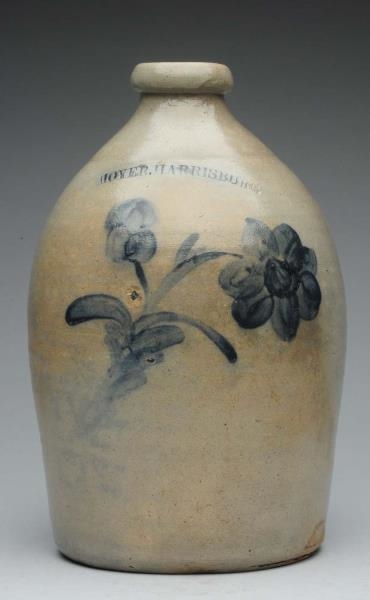 ONE GALLON JUG WITH DOUBLE FLOWER DECOR.          
