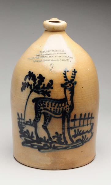 3 GALLON JUG WITH DEER IN HEAVY BLUE DECORATION.  