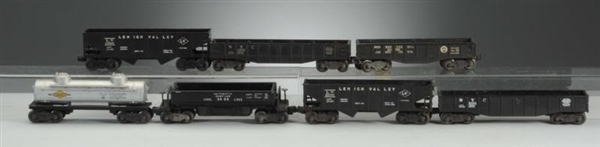 LIONEL 7PC ASSORTED FREIGHT CARS.                 