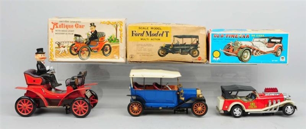 LOT OF 3: BOXED ANTIQUE CARS.                     