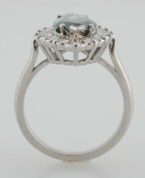 PLATINUM & IRRADIATED BLUE MARQUISE DIAMOND RING. 
