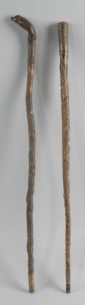 LOT OF 2: CARVED CANES.                           