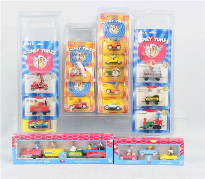 LOT OF 6 LOONEY TUNES VEHICLES IN CASES.          