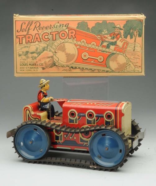 TIN LITHO MARX WIND-UP TRACTOR TOY.               