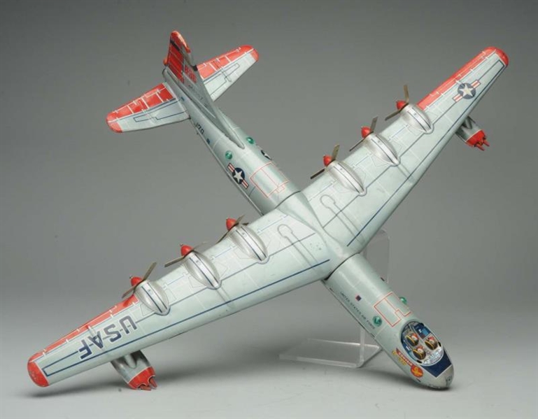 TIN LITHO FRICTION B-36 CORVAIR AIRPLANE.         