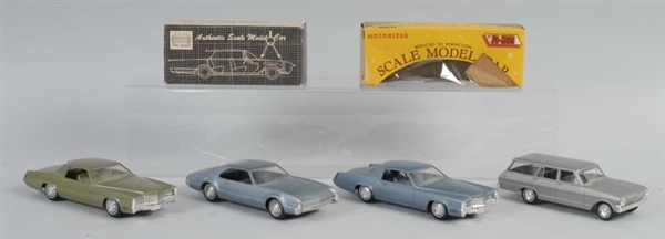 LOT OF 4: SCALE MODEL CARS.                       