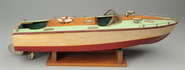 BATTERY-OPERATED WOODEN BOAT.                     
