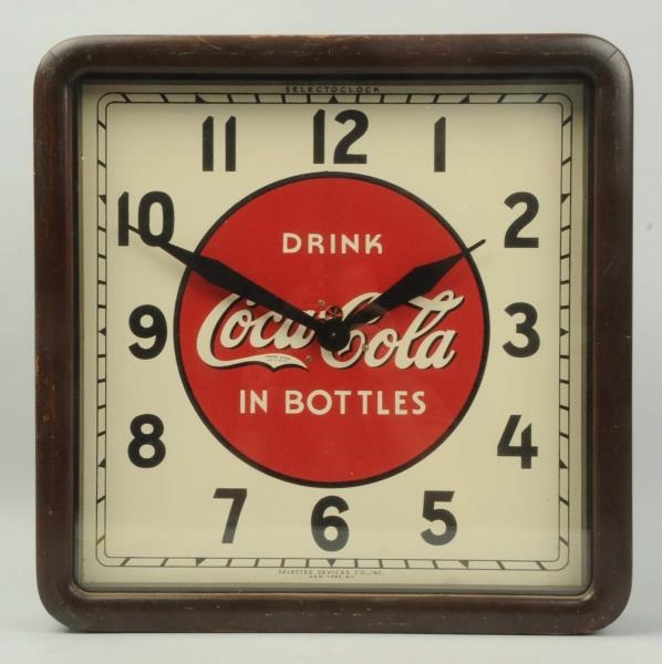 1940S COCA-COLA WOOD FRAMED CLOCK.                
