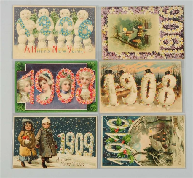 LOT OF 6: NEW YEAR HOLD-TO-LIGHT POSTCARDS.       