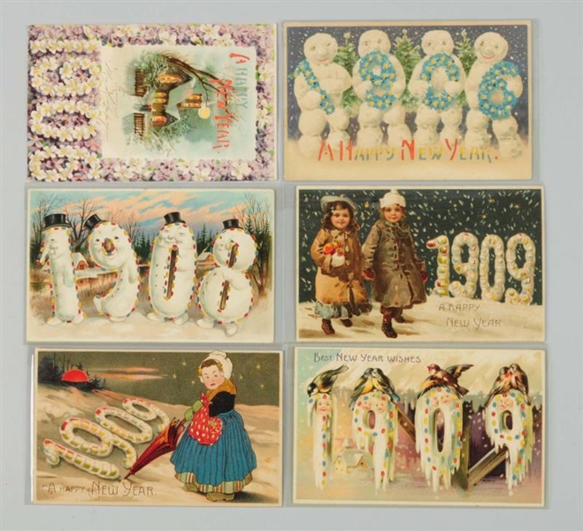 LOT OF 6: NEW YEAR HOLD-TO-LIGHT POSTCARDS.       
