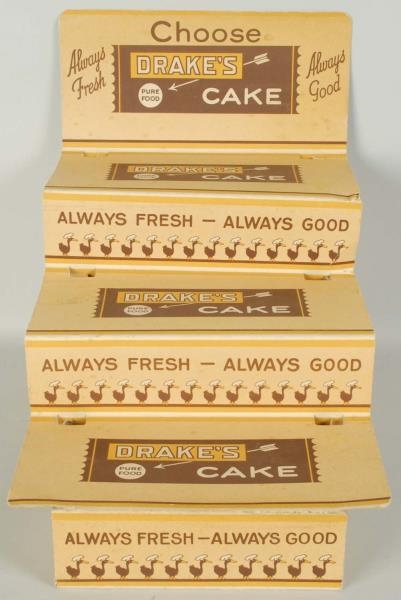 1940S-50S DRAKES CAKES CARDBOARD RACK.           