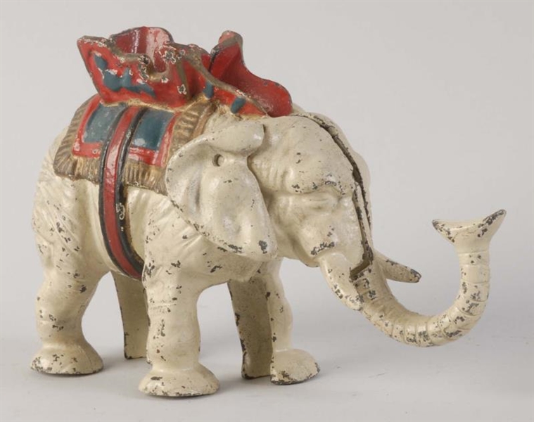ELEPHANT WITH TRUNK MECHANICAL BANK.              