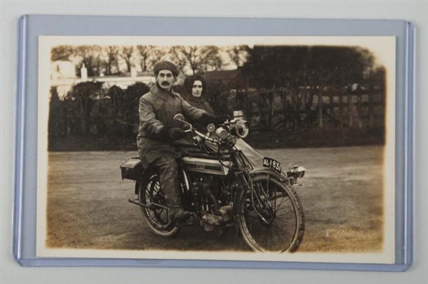 MAN & WOMAN ON MOTORCYCLE REAL PHOTO POSTCARD.    
