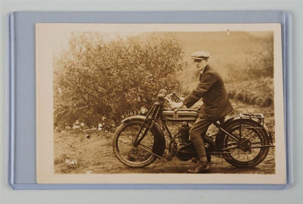 MAN ON TRIUMPH MOTORCYCLE REAL PHOTO POSTCARD.    