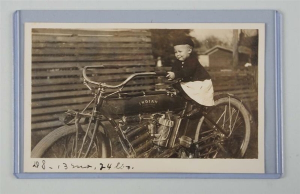 CHILD ON INDIAN MOTORCYCLE REAL PHOTO POSTCARD.   