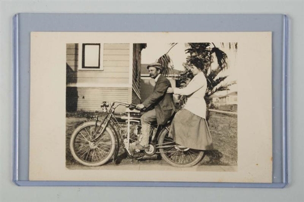 MAN & WOMAN ON INDIAN MOTORCYCLE RPPC             