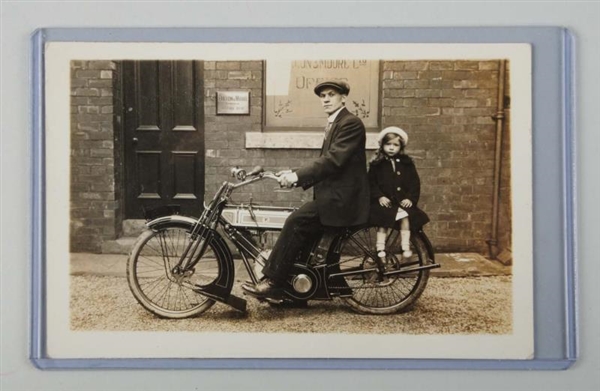 MAN & CHILD ON MOTORCYCLE REAL PHOTO POSTCARD.    