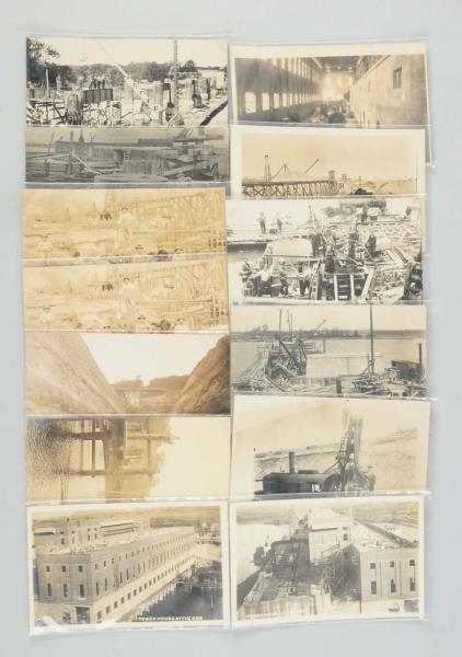 LOT OF 13: DAM BUILDING REAL PHOTO POSTCARDS.     