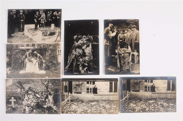 LOT OF 6: POSTCARDS OF EXHUMED BODIES AND GRAVES. 