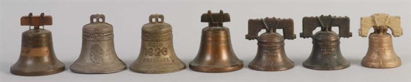 LOT OF 7: LIBERTY BELL CAST IRON BANKS.           