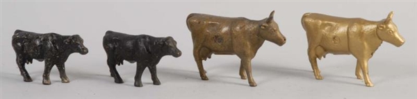 LOT OF 4: CAST IRON COW STILL BANKS.              