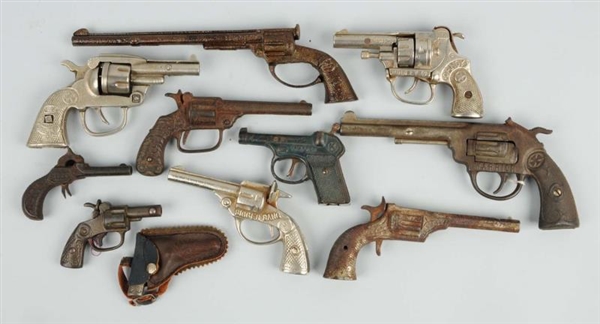 LARGE LOT OF EARLY CAST IRON CAP GUNS.            