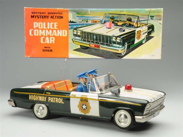 BATTERY-OPERATED POLICE COMMAND CAR.              
