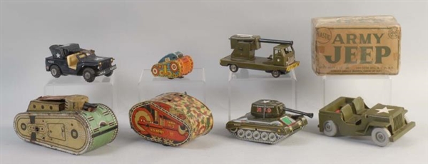 LOT OF 7: ARMY TOY VEHICLES.                      