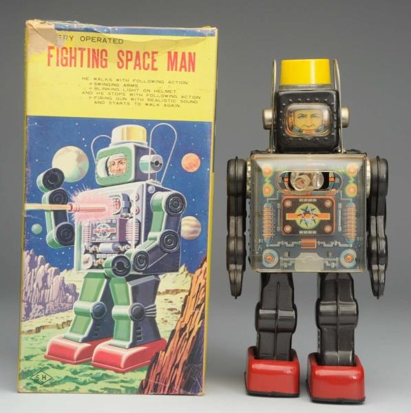 JAPANESE BATTERY OPERATED FIGHTING SPACE MAN.     