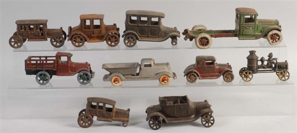 LARGE LOT OF CAST IRON CAR TOYS.                  