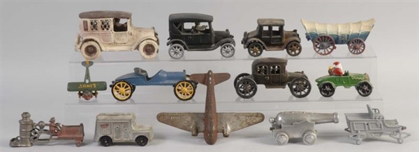 LARGE LOT OF CAST IRON CAR TOYS & STILL BANKS.    