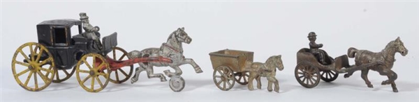 LOT OF 3: CAST IRON HORSE & WAGONS.               