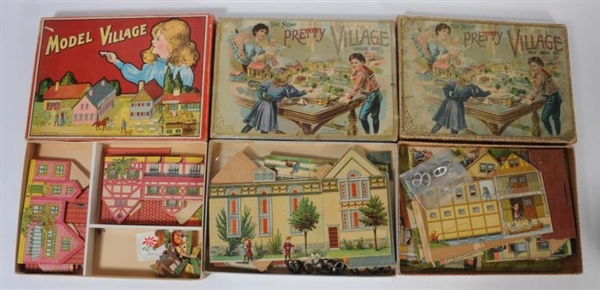 LOT OF 3: BOXES OF PRETTY VILLAGE.                