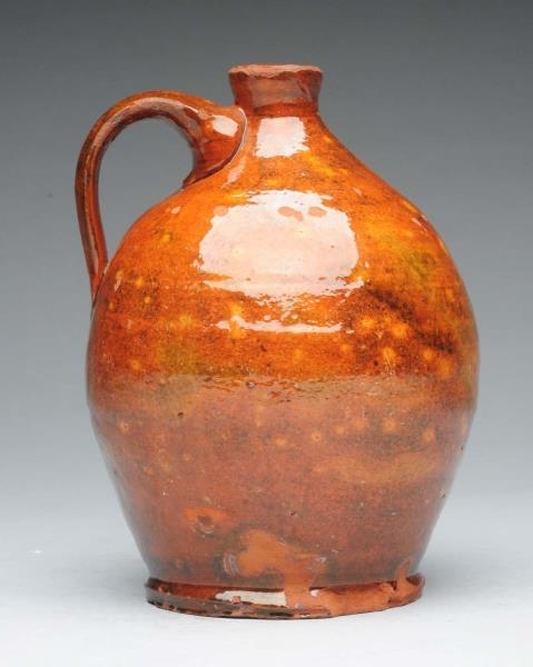 OVOID REDWARE JUG WITH SPECKLES.                  