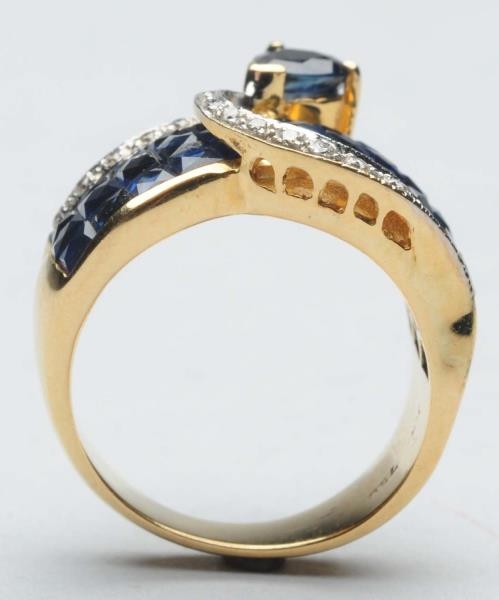 18K SAPPHIRE WITH DIAMOND ACCENT RING.            
