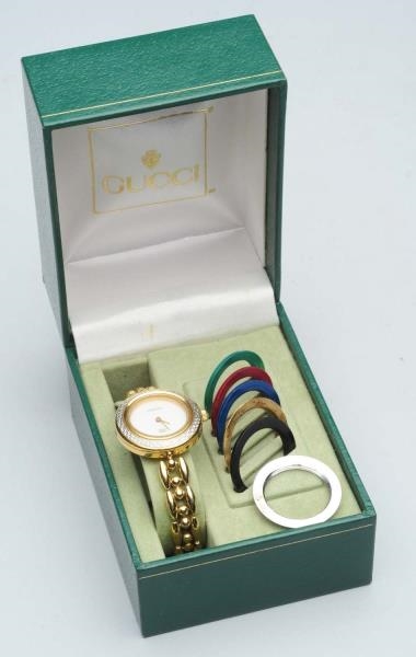 GUCCI LADIES WATCH WITH EXCHANGEABLE FACES.       