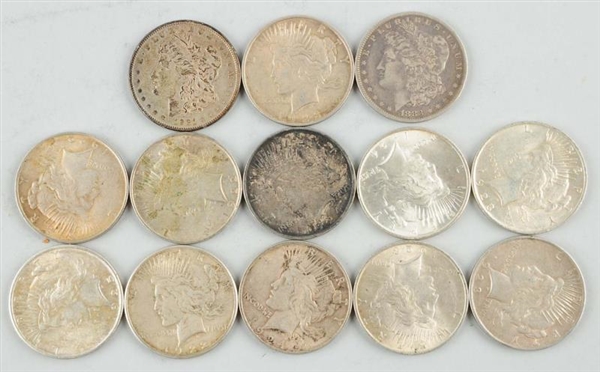 LOT OF 13: SILVER DOLLARS.                        